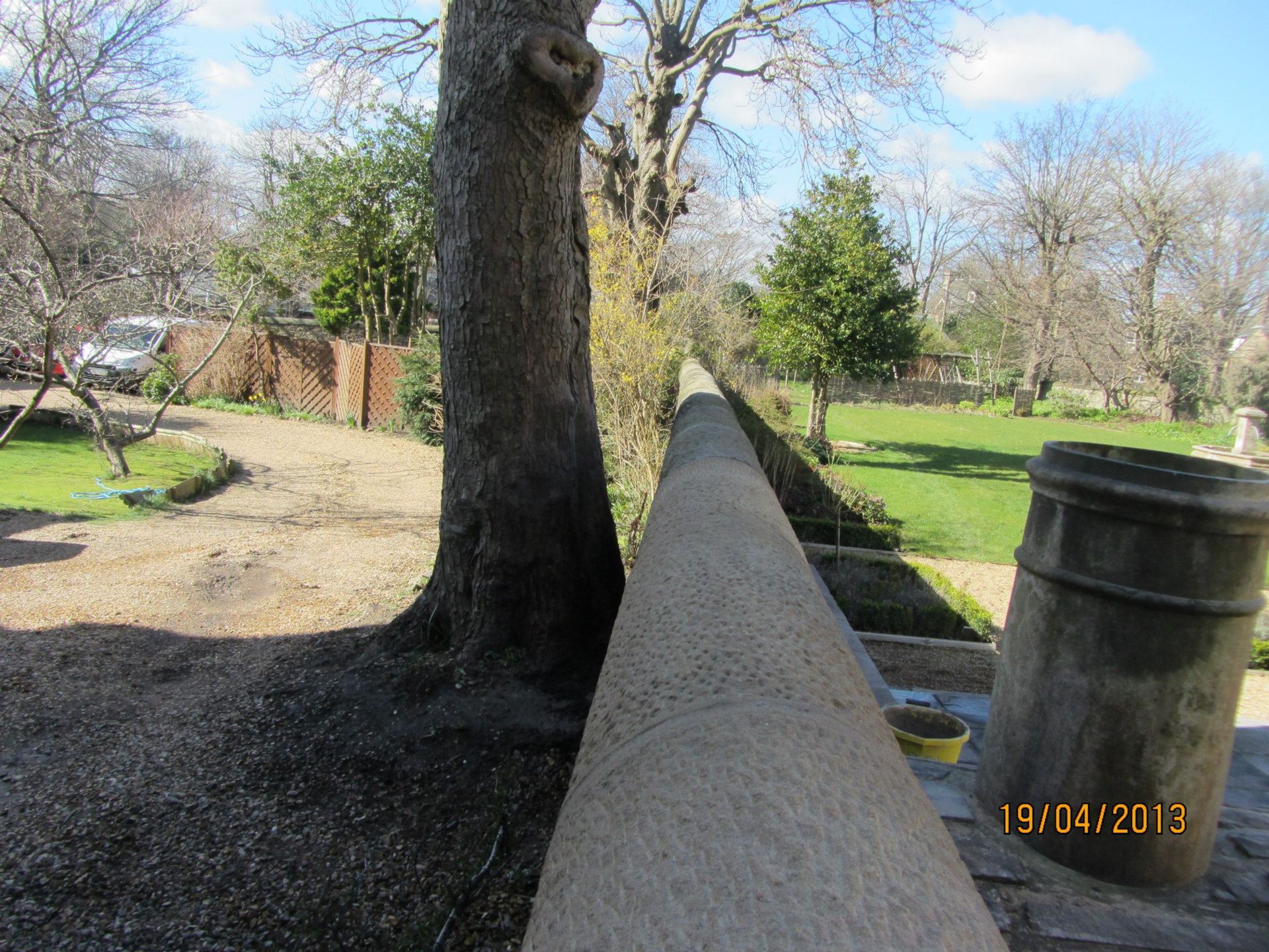 Intricate stonework on historic garden wall by IMC Stonemasons in Edinburgh, professional craftsmanship.