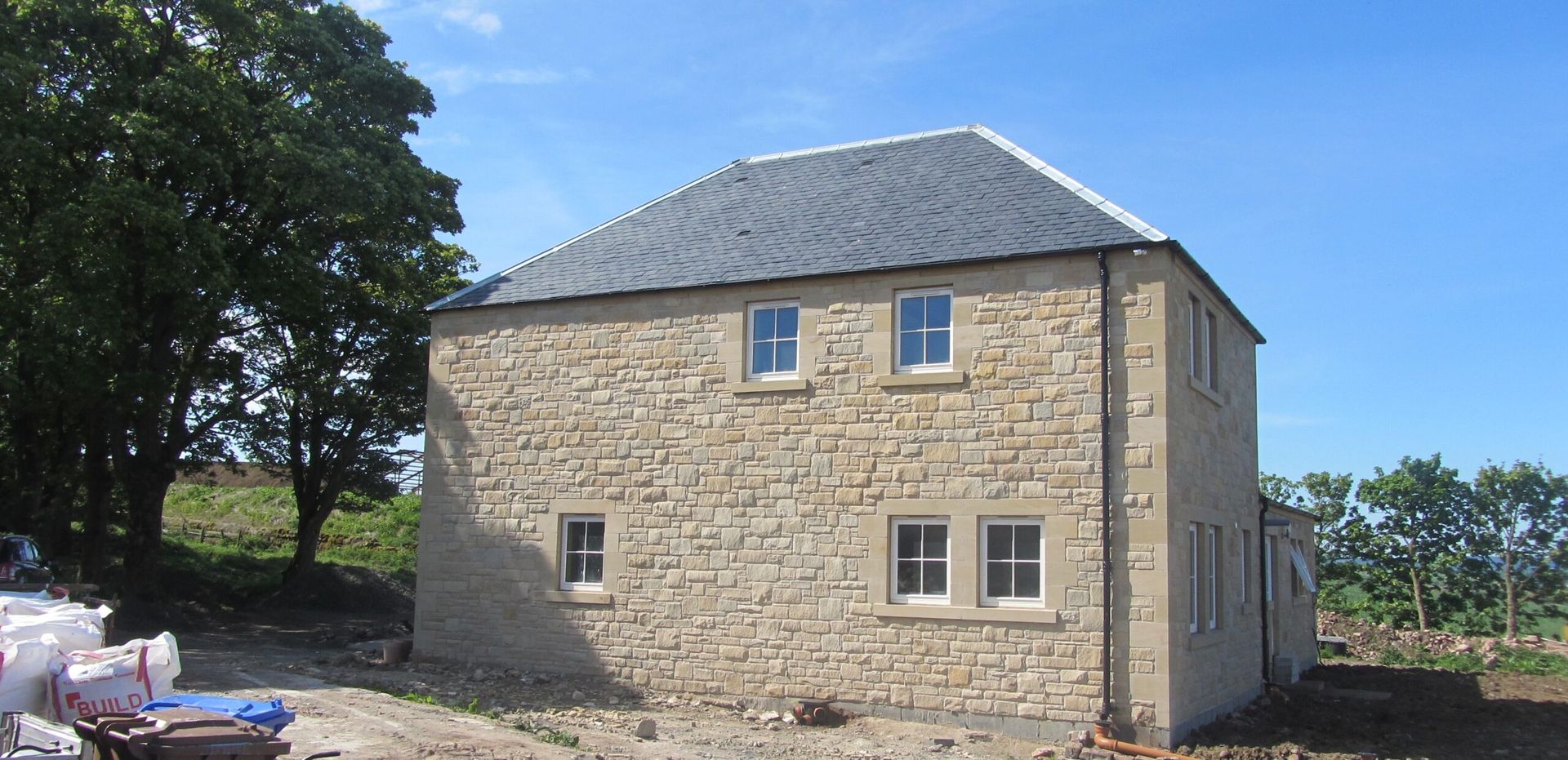 Handcrafted sandstone masonry for Scottish historic buildings and modern renovations.